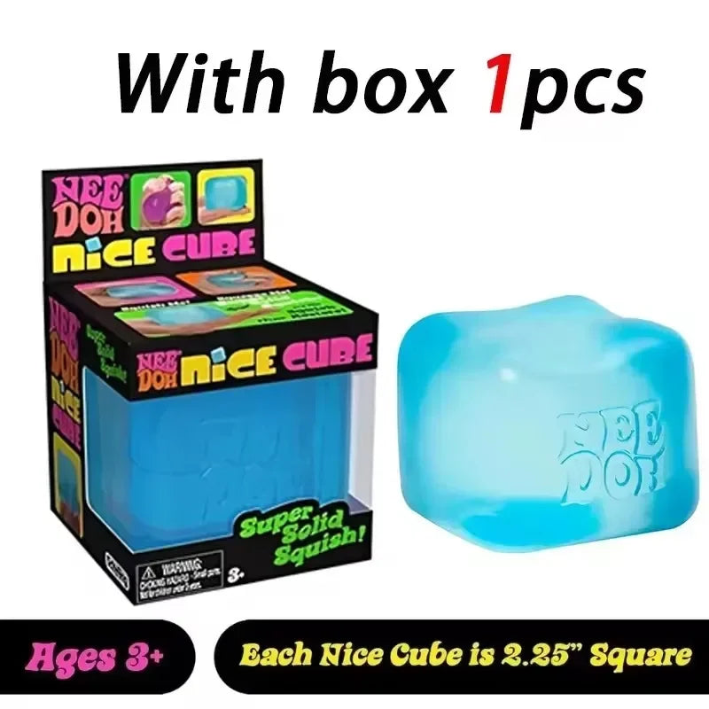Boîte Mystère NeeDoh Atomic avec un squishy surprise ultra doux à collectionner.