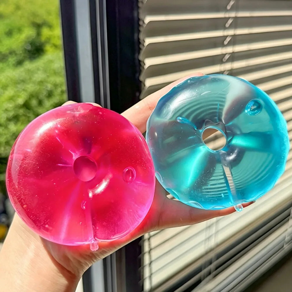 Squishy donut bleu et rose ultra doux à effet slow rise pour soulager le stress.