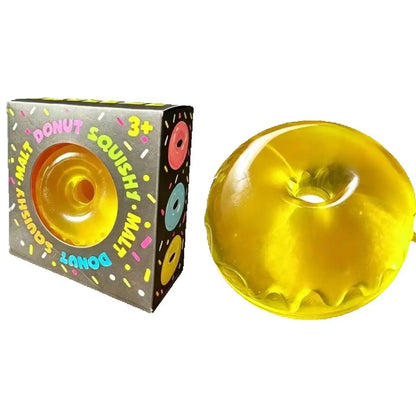 Squishy donut jaune ultra doux à effet slow rise pour soulager le stress.