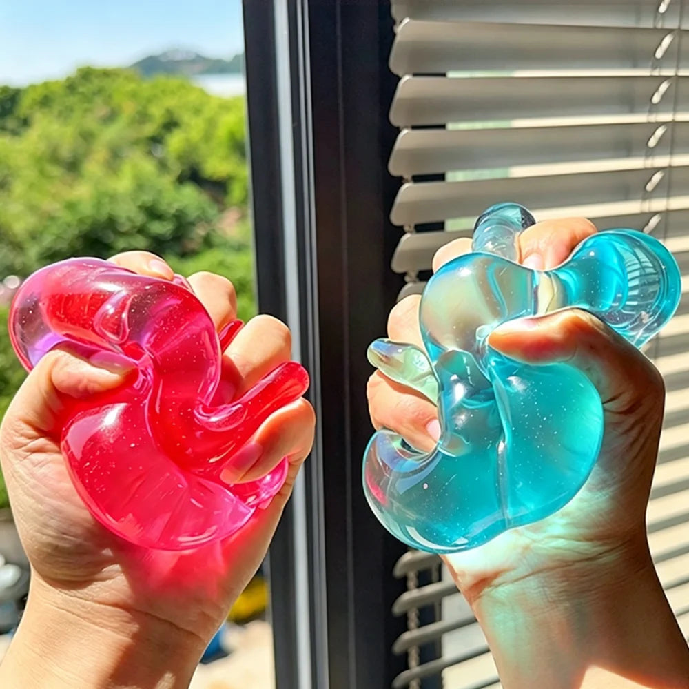 Squishy donut rose et bleu pressé ultra doux à effet slow rise pour soulager le stress.