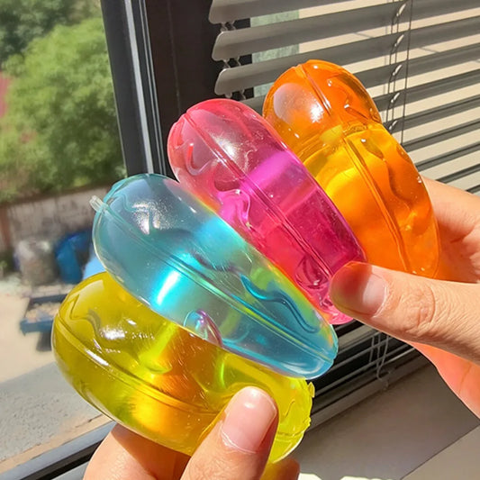 Collection de squishies donuts colorés, jouets sensoriels slow rise.