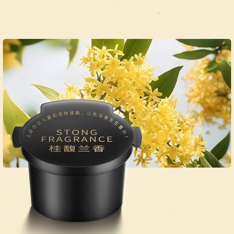 Diffuseur d'aromathérapie Nuvexer noir pour voiture avec parfum naturel de fleurs jaunes en arrière-plan