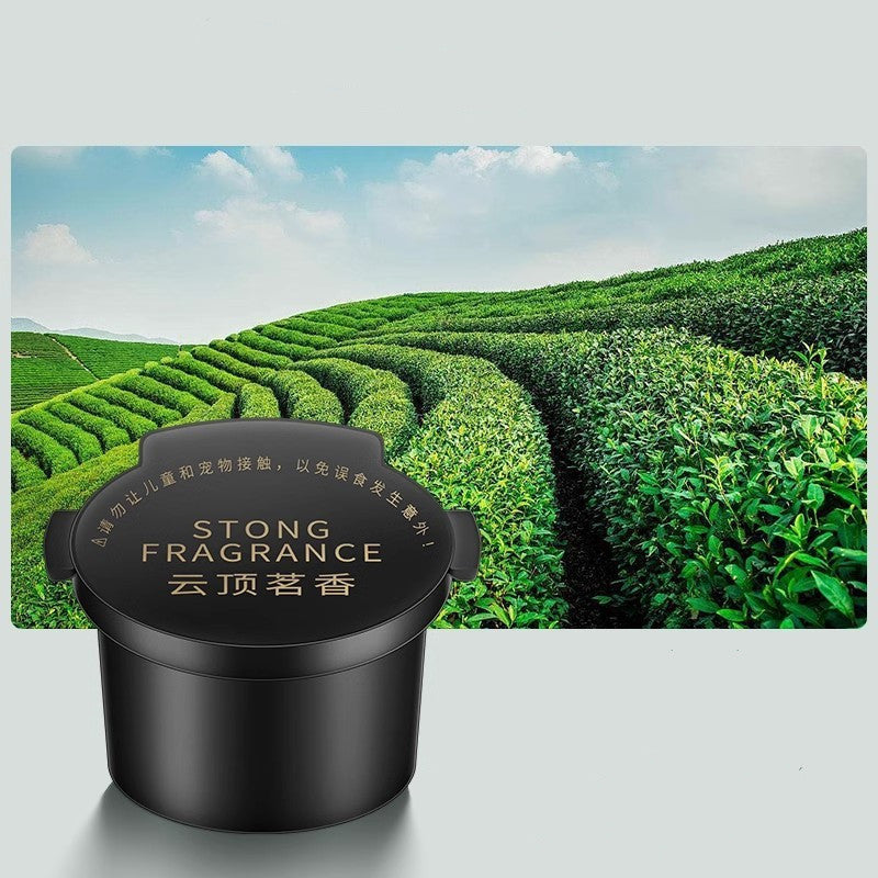 Diffuseur d'aromathérapie Nuvexer pour voiture avec couvercle noir et design de plantation de thé en arrière-plan